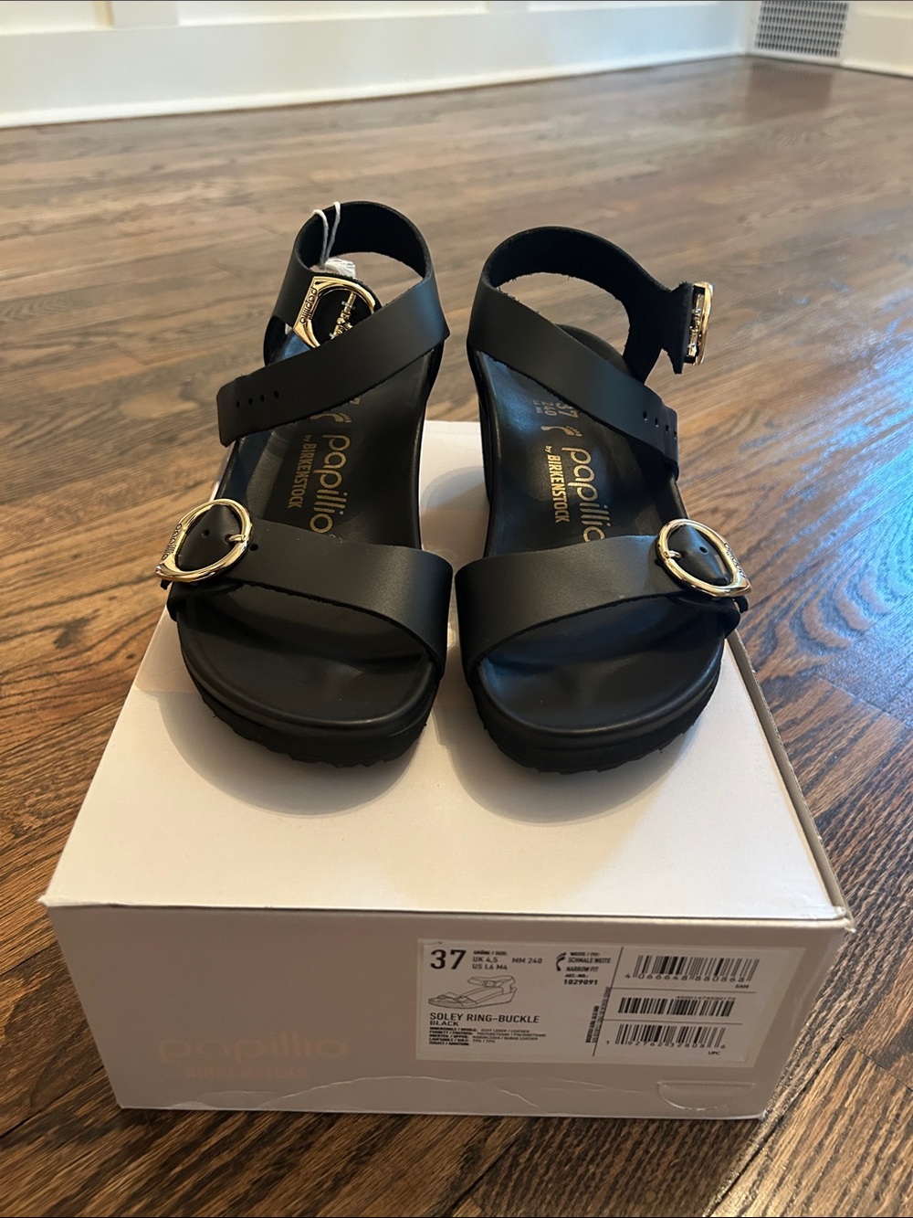 Papillio by Birkenstock Black Sandals with Gold Ring Buckles